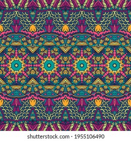 Abstract ethnic tribal festive pattern for fabric. Geometric doodle colorful seamless pattern ornamental.