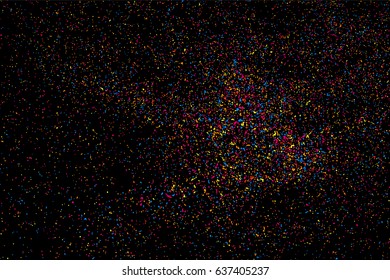Abstract explosion of confetti. Colored stains and blots. Colorful grainy texture isolated on black background.  Vector illustration,eps 10.