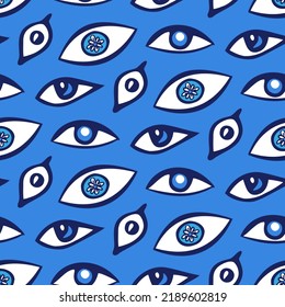 Abstract eyes print. Modern witchcraft seamless texture. Blue and white magic doodle with all-seeing divine gaze. Hand drawn secret esoteric symbol. Pattern for creating talismans from the evil eye.