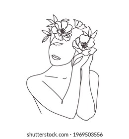 Abstract face with flowers, line drawing. Portrait minimalistic style.  Botanical print. Nature symbol of cosmetics. Modern continuous line art. 
Fashion print. Beaty salon art
