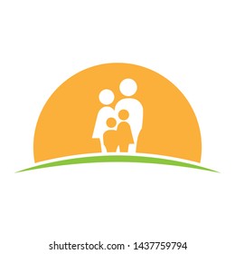 abstract family, green field and huge orange sun, vector logo icon