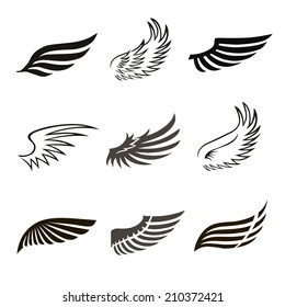 Abstract feather angel or bird wings icons set isolated vector illustration
