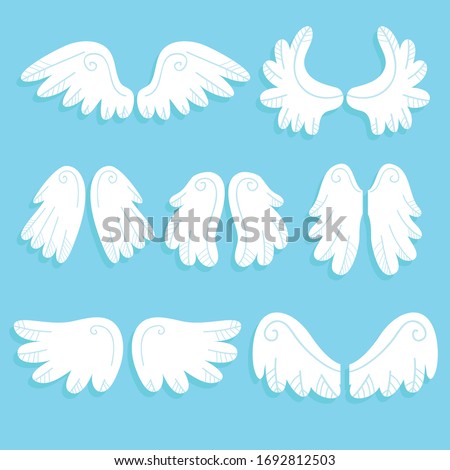 Abstract feather angel or bird wings icons set flat style