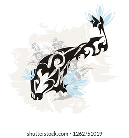 Abstract fish on a gray backdrop. The unusual black flaming peaked fish symbol with decorative elements on a grunge background