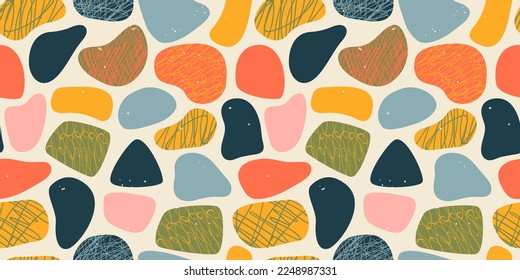 Abstract flat organic shapes seamless pattern. Trendy colorful freehand shape background design. Scribble decoration wallpaper, artistic terrazzo style stones or childish blobs.