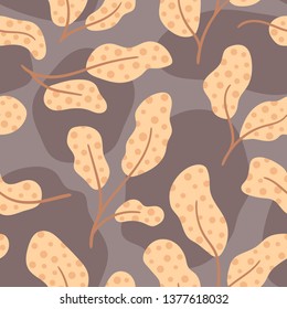 Abstract floral & animal print design. Seamless vector background in warm shades 