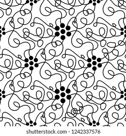 Abstract floral doodle seamless pattern in black colors on a white background
