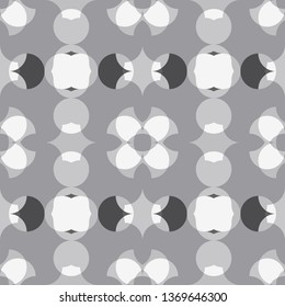 Abstract floral geometric seamless pattern . Kaleidoscopic, light white and grey colored shapes.