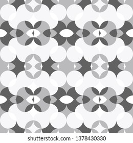 Abstract floral geometric seamless pattern . Kaleidoscopic, light white and grey colored shapes.