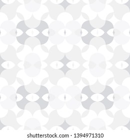 Abstract floral geometric seamless pattern . Kaleidoscopic, light white and grey colored shapes.