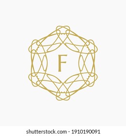 abstract floral mandala logo with the letter F in the middle. editable and easy to custom