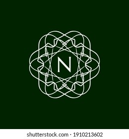 abstract floral mandala logo with the letter N in the middle. editable and easy to custom