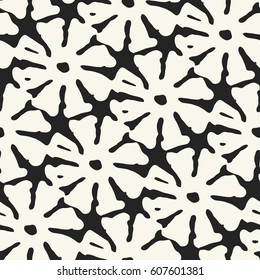Abstract floral motif textured background. Seamless pattern.
