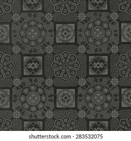 Abstract floral old mosaic tile texture vintage ornament seamless tribal ethnic. Black and gray colors
