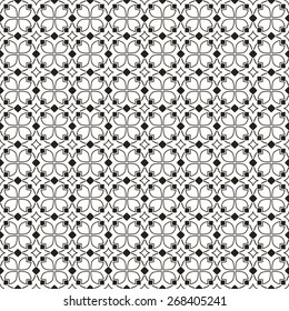 Abstract floral pattern. Geometric seamless pattern in white and black colors. Vector