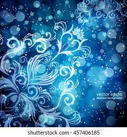 Abstract floral pattern on a blue background, made of transparent rays, stars, bokeh. Magical fantasy flowers design card.  Vector illustration.