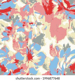 Abstract Floral pattern on fabric. red flowers with blue and yellow leaves print as background.