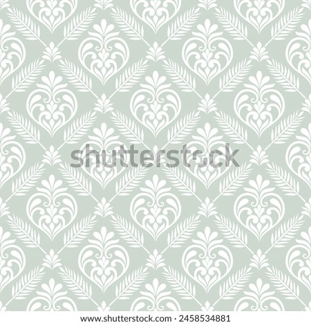 Abstract floral pattern. Wallpaper baroque, damask. Seamless background. Green and white ornament.