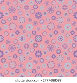 Abstract floral patterns of varying sizes and designs, in shades of light blue, bluish-purple, and pale purple, are evenly distributed on a pink background for textile design, clothing,carpet,wallpaper, graphic backgrounds, vector illustration. I drew this by myself, it's not AI generated.