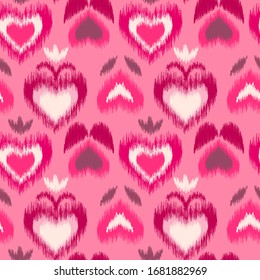 Abstract floral scribble Ikat pink hearts seamless pattern on pink background. Ethnic asian, uzbek, indian, aztec style. Fancy tribal texture for fabric print, wallpaper, gift wrap, cards.