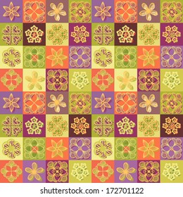Abstract floral seamless background in cell. Vector pattern with decorative flowers.