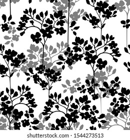 Abstract floral seamless pattern in black and white colors. Silhouettes of vertical branches with flowers, leaves on white background. Art illustration for textile, fabric, wallpaper. Vector, EPS 10