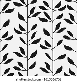 Abstract floral seamless pattern with black vertical branches and leaves on white background; floral design for fabric, wallpaper, textile, web design.