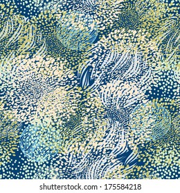 Abstract floral seamless pattern in blue, yellow, green and pink colors