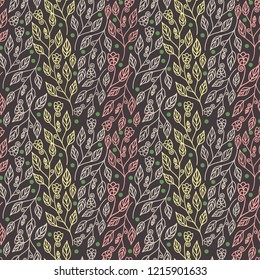Abstract floral seamless pattern with colorful leaves and beautiful flowers in dark background for wallpaper, texture, fabric, textile, and surface design