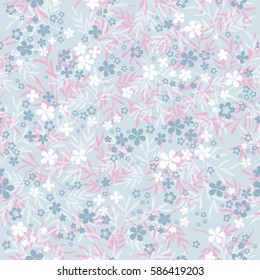 Abstract floral seamless pattern. Gently small flowers on gray background. Millefleur style. 