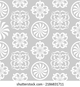 Abstract floral seamless pattern. Gray and white. Vector background.