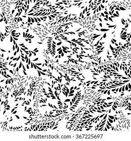 Abstract floral seamless pattern with leaves  Swirl floral doodle texture. Ornamental wave  plant background.