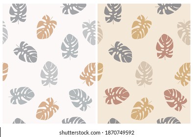 Abstract Floral Seamless Vector Patterns Set. Simple Gray, Gold, Brown and Pale Rad Monstera Leaves Isolated on a Light Beige and Off-White Background. Tropical Print ideal for Fabric, Textile. 