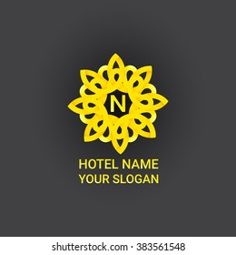 Abstract flower circle logo in golden colors. Vector illustration for your graphic design.