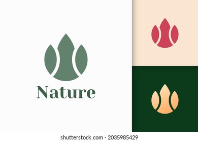 Abstract flower logo in simple and luxury style for health and beauty