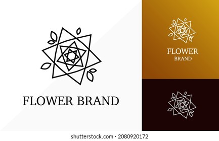 abstract flower shape made of triangles and leaves. logo for a store or brand