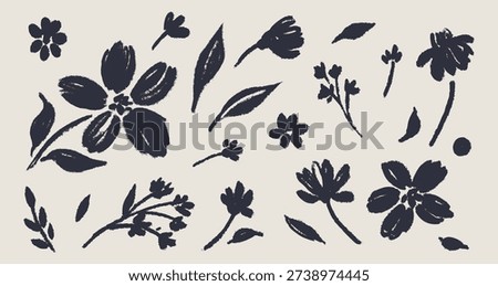 Abstract flowers and leaves drawn with an ink brush. Black plant elements isolated on a white  background. Hand drawn vector flower graphics