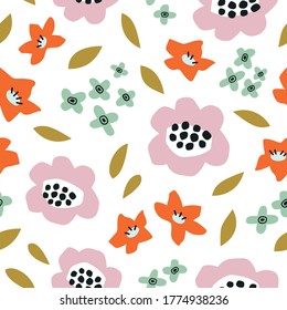 Abstract flowers and leaves isolated on a white background. Drawn by hand vector seamless pattern. Floral pattern. Stylized flowers in doodle style. Flat design for textile, wrapping paper, wallpaper.
