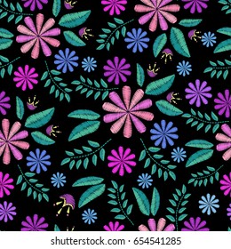 Abstract flowers on dark background, embroidery, colorful seamless pattern