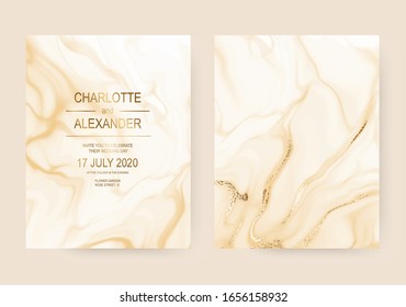 Abstract fluid gold marble wedding invitation cards with sparkle waves.