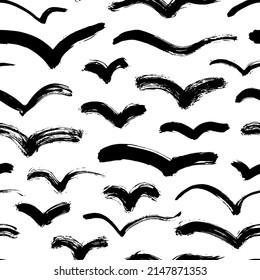 Abstract flying birds vector seamless pattern. Hand drawn black bird silhouettes on white background. Black curved lines and wavy brushstrokes. Abstract wallpaper design, trendy textile print. 