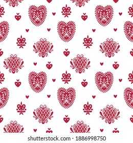 Abstract folk seamless pattern with decorative elements, flowers and hearts
