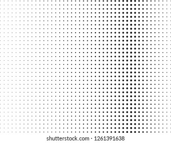 Abstract futuristic halftone pattern. Comic background. Dotted backdrop with circles, dots, point large scale. Design element for web banners, posters, cards, wallpapers, sites. Black and white color