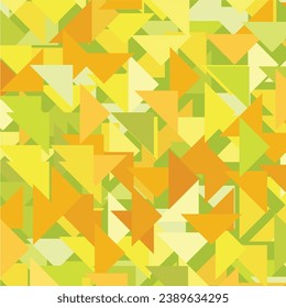 Abstract geometric background of chaotic triangles in green and orange colors.