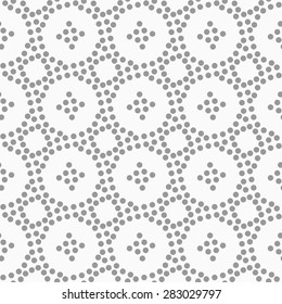 Abstract geometric background. Gray seamless pattern. Monochrome texture.Dotted circles and small crosses.