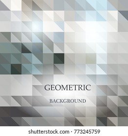 Abstract geometric background from  gray triangles, with sample text.