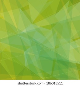 Abstract geometric background with green and yellow triangles.