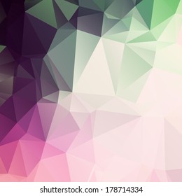 Abstract geometric background with pink and green polygonal pattern