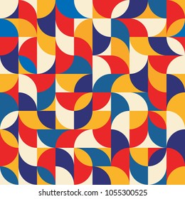 Abstract geometric background - seamless vector pattern illustration in blue, red and yellow colors. Mosaic ornament structure.