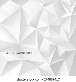 Abstract geometric background with white shapes.